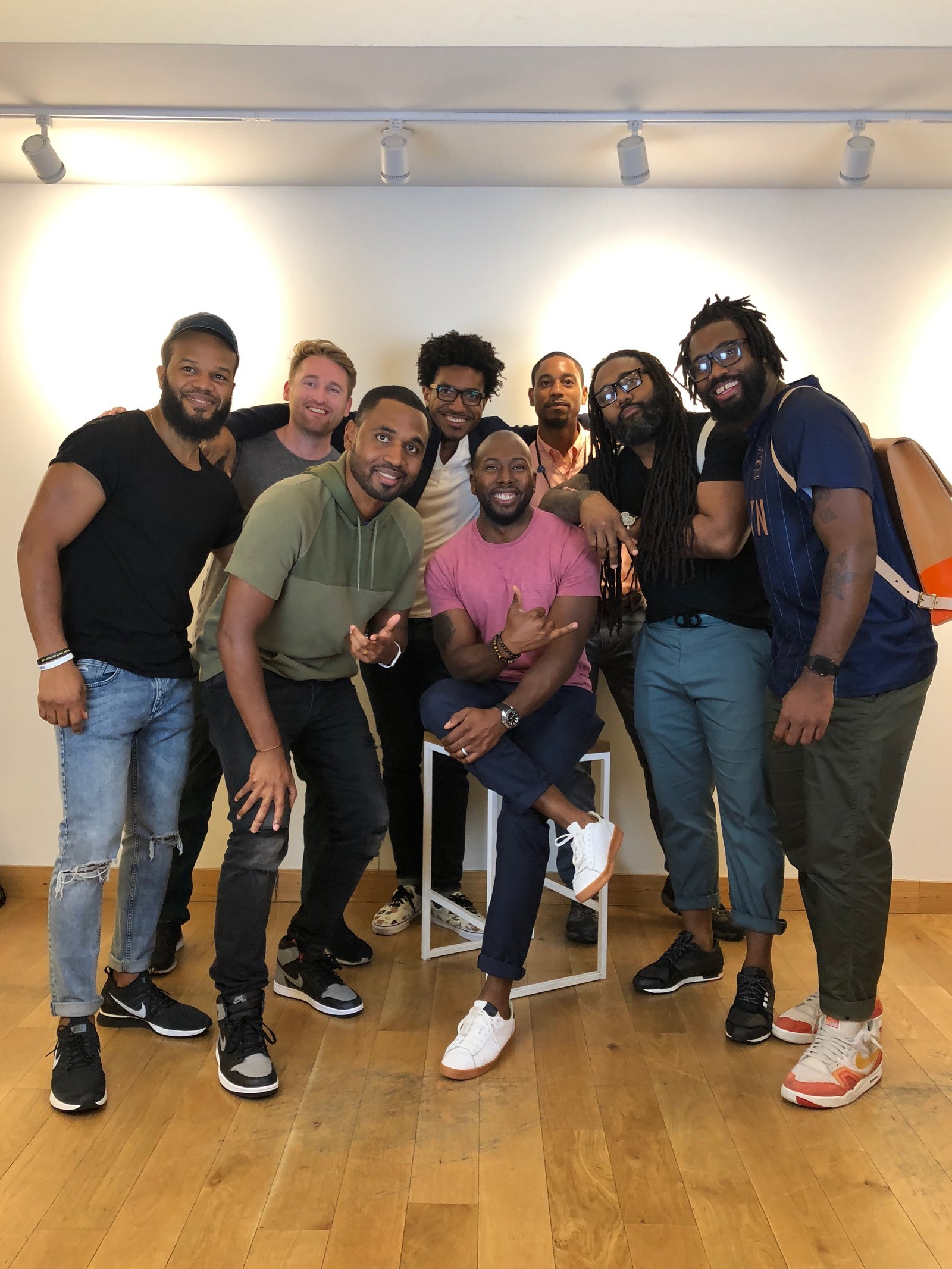 Group photo with the Lululemon team posing together indoors