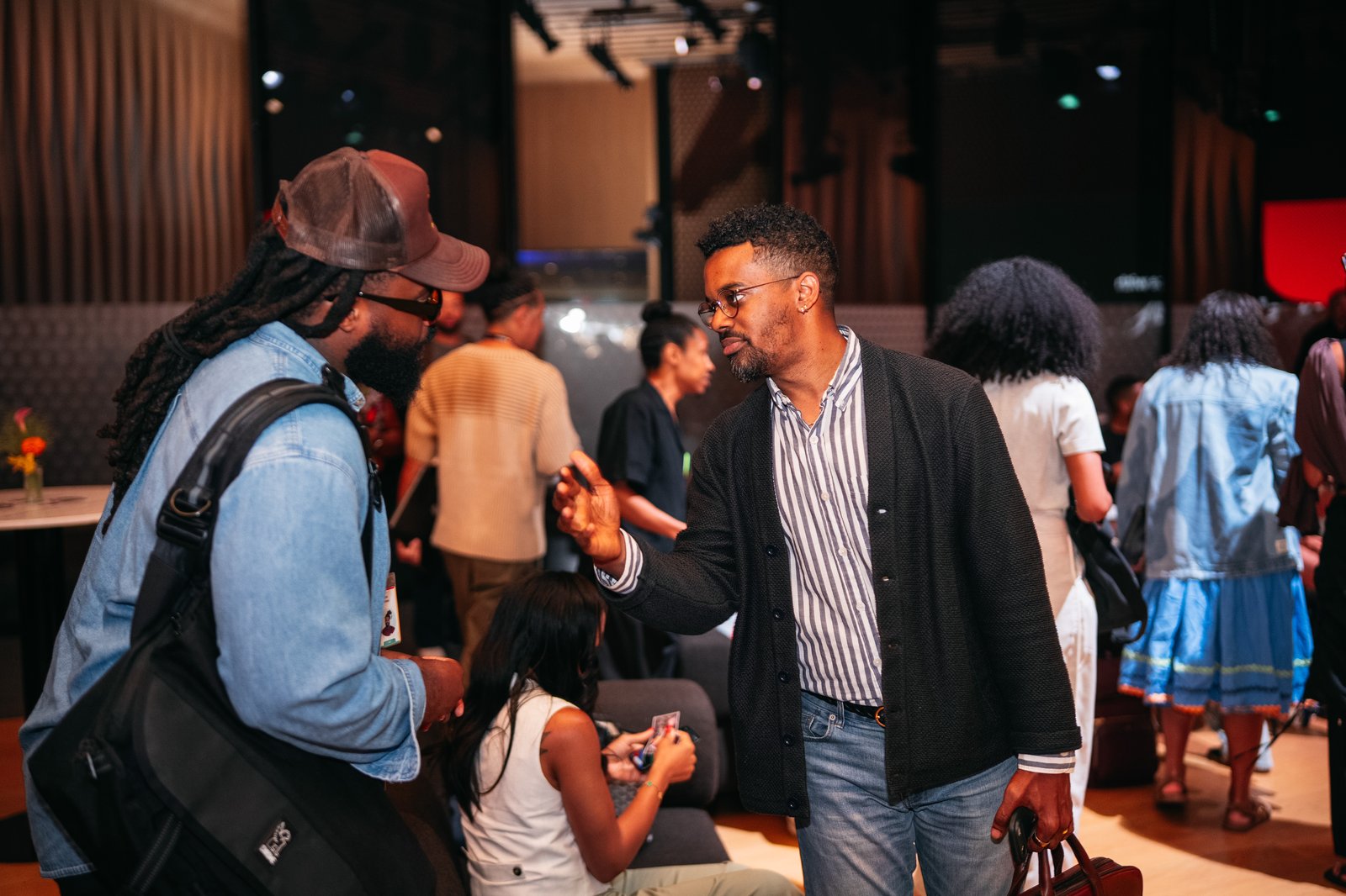 Conversation with a colleague at an evening networking event