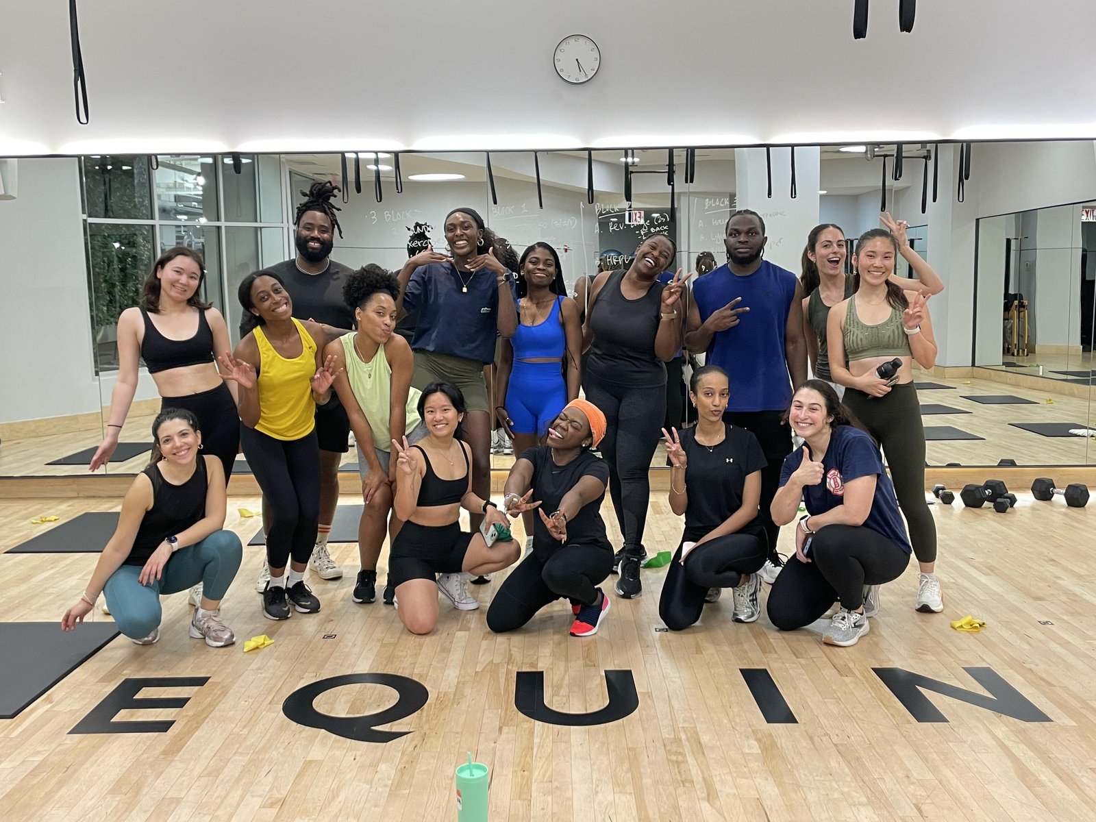 Group fitness class photo on the Equinox studio floor